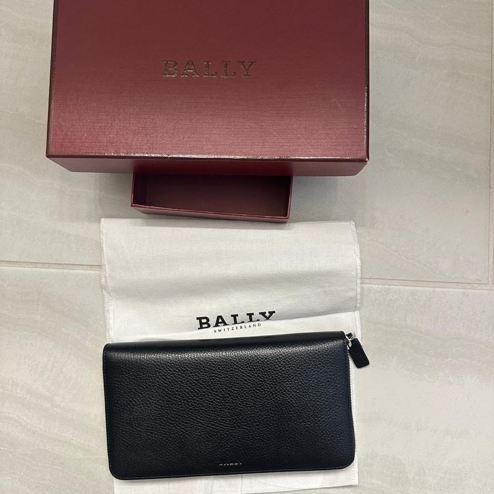 Brand new Bally Black Leather Clutch with Burgundy Box